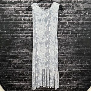 Aila Blue snake-print maxi dress with a ruffled hem in grey and baby pink!